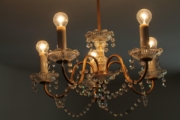 Illuminating History: The Timeless Elegance of Antique Chandeliers